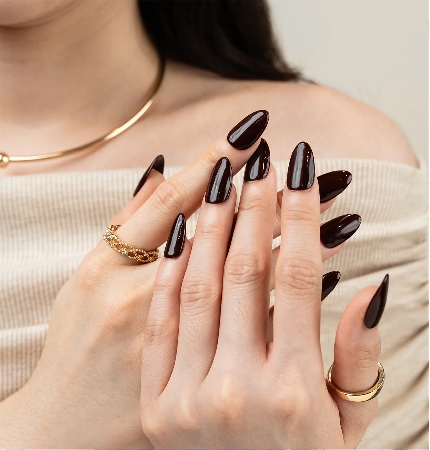 POMÉ Signature Gel in a deep bordeaux on almond nails