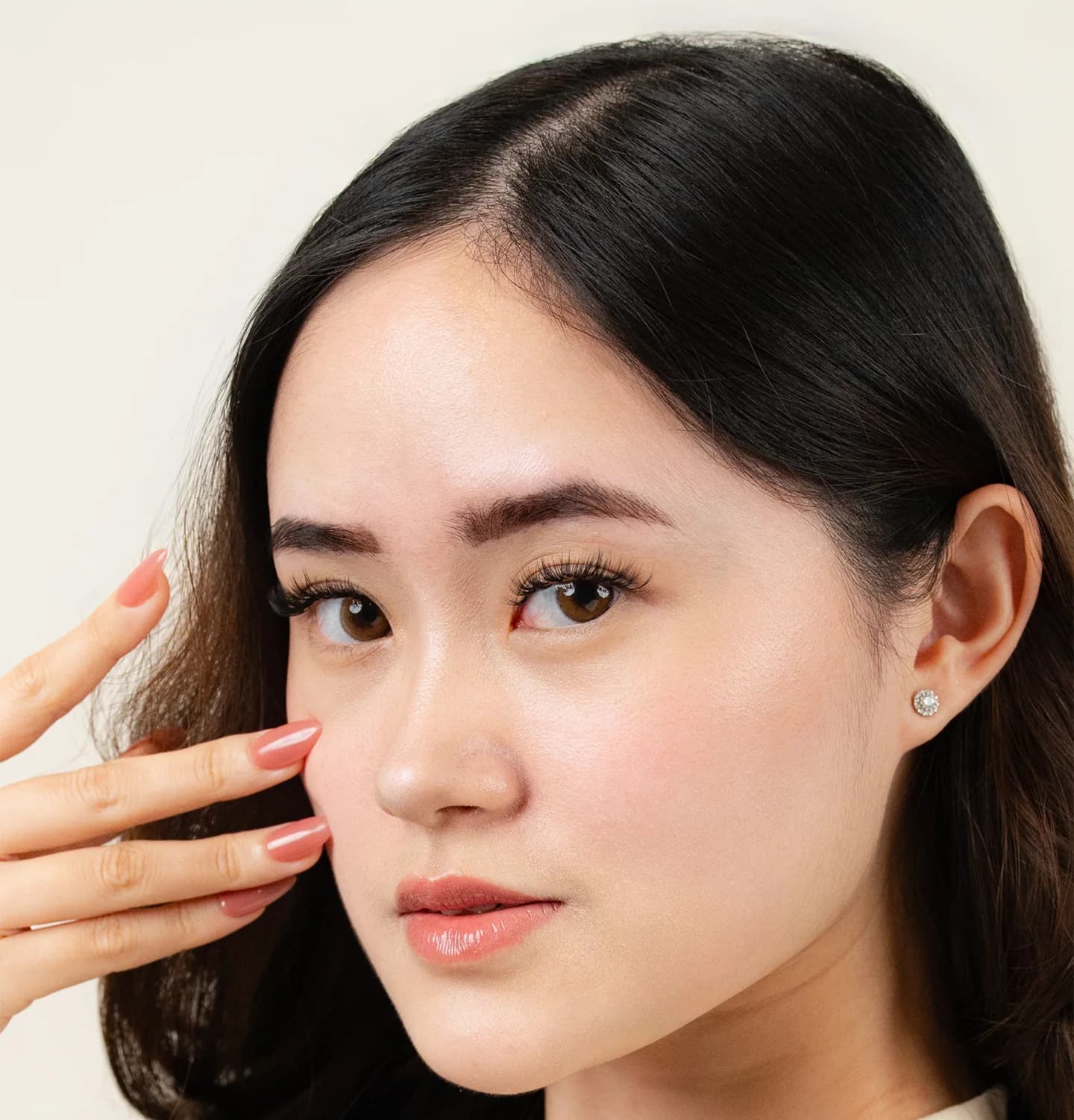A POMÉ client wearing Signature Lash extensions